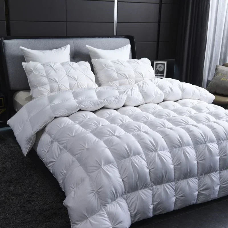 Alira warm goose down duvet in white with quilted pillows in a dark panelled bedroom