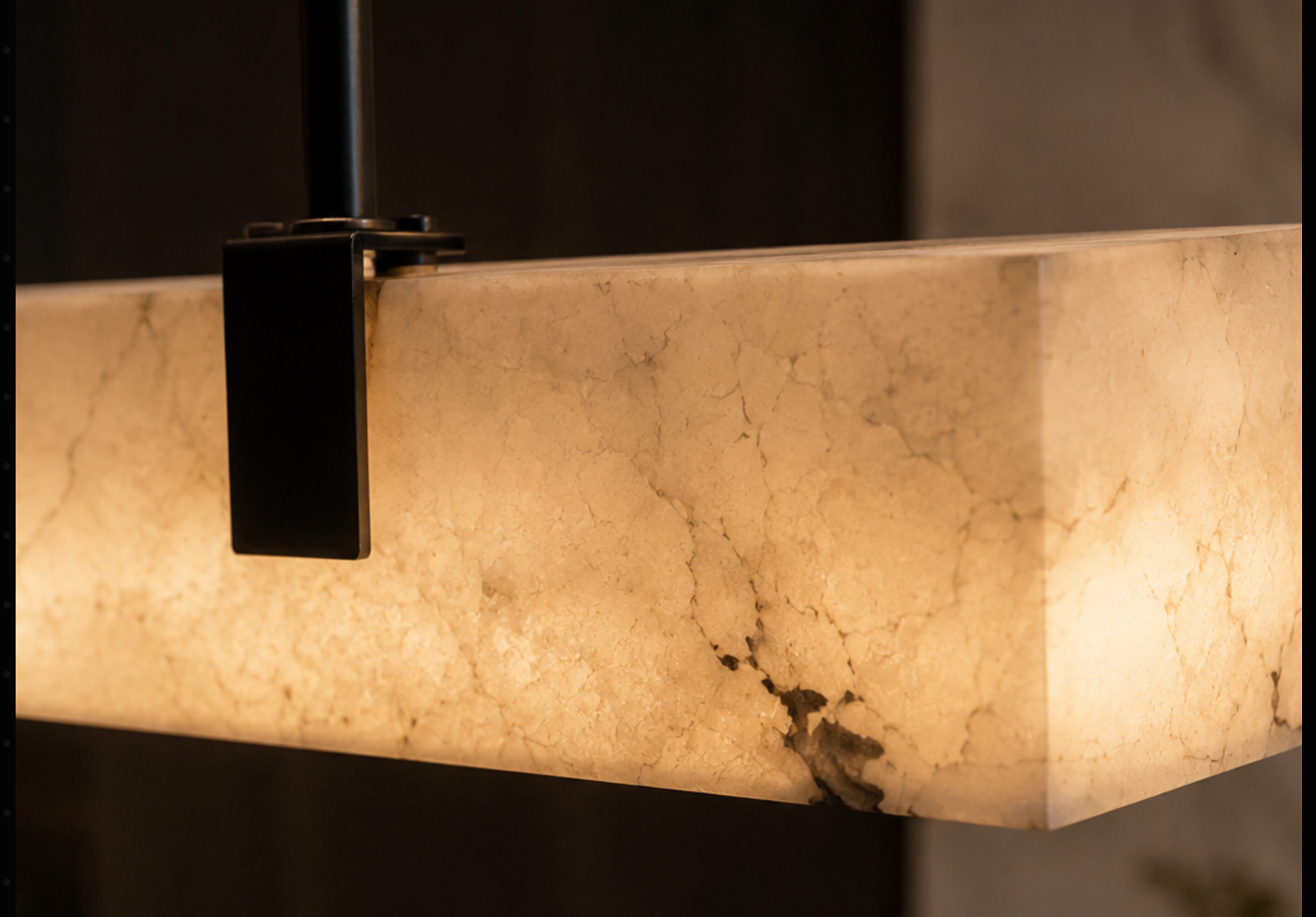 Suka linear faux-marble pendant light above a kitchen island