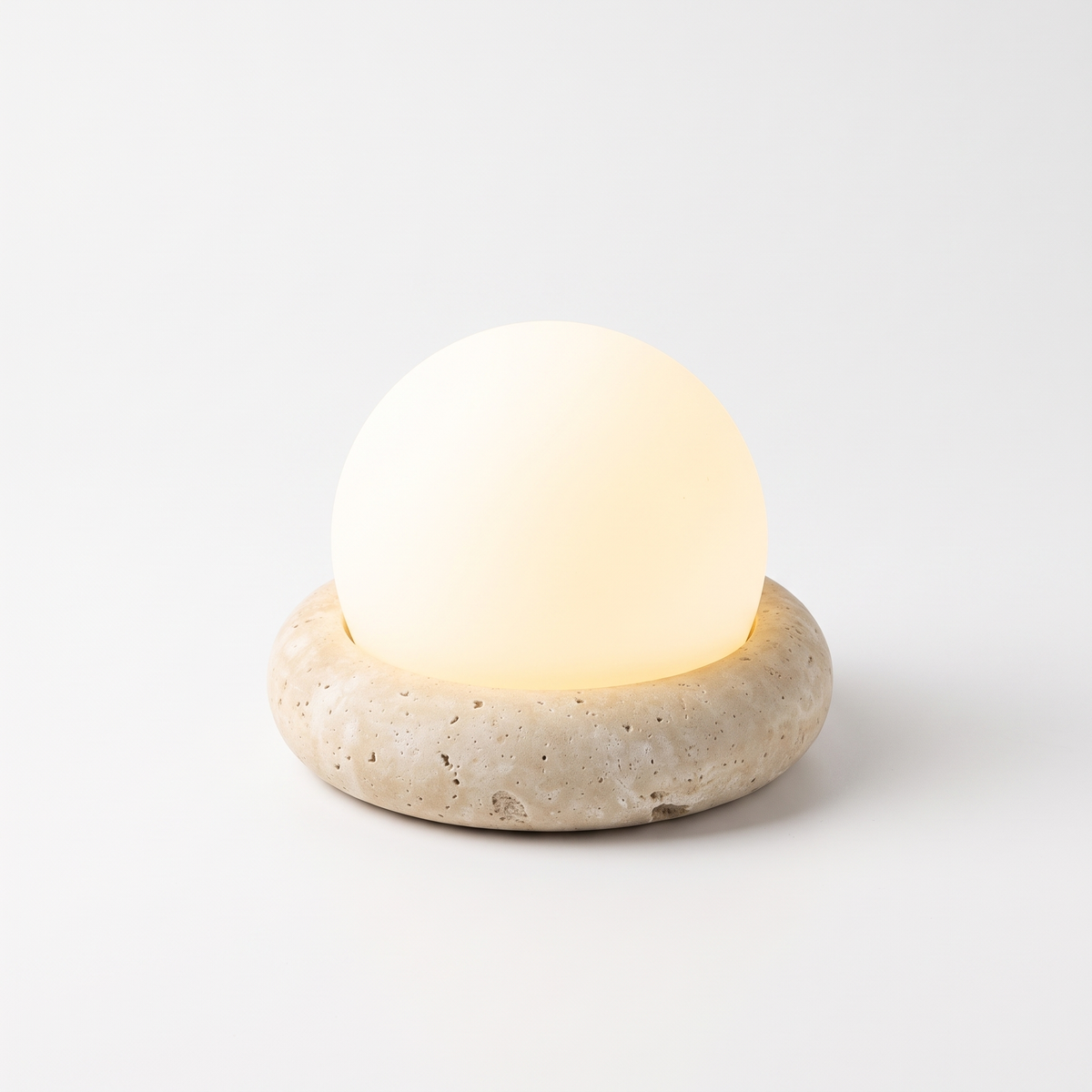 Amber travertine cordless LED table lamp on a white background