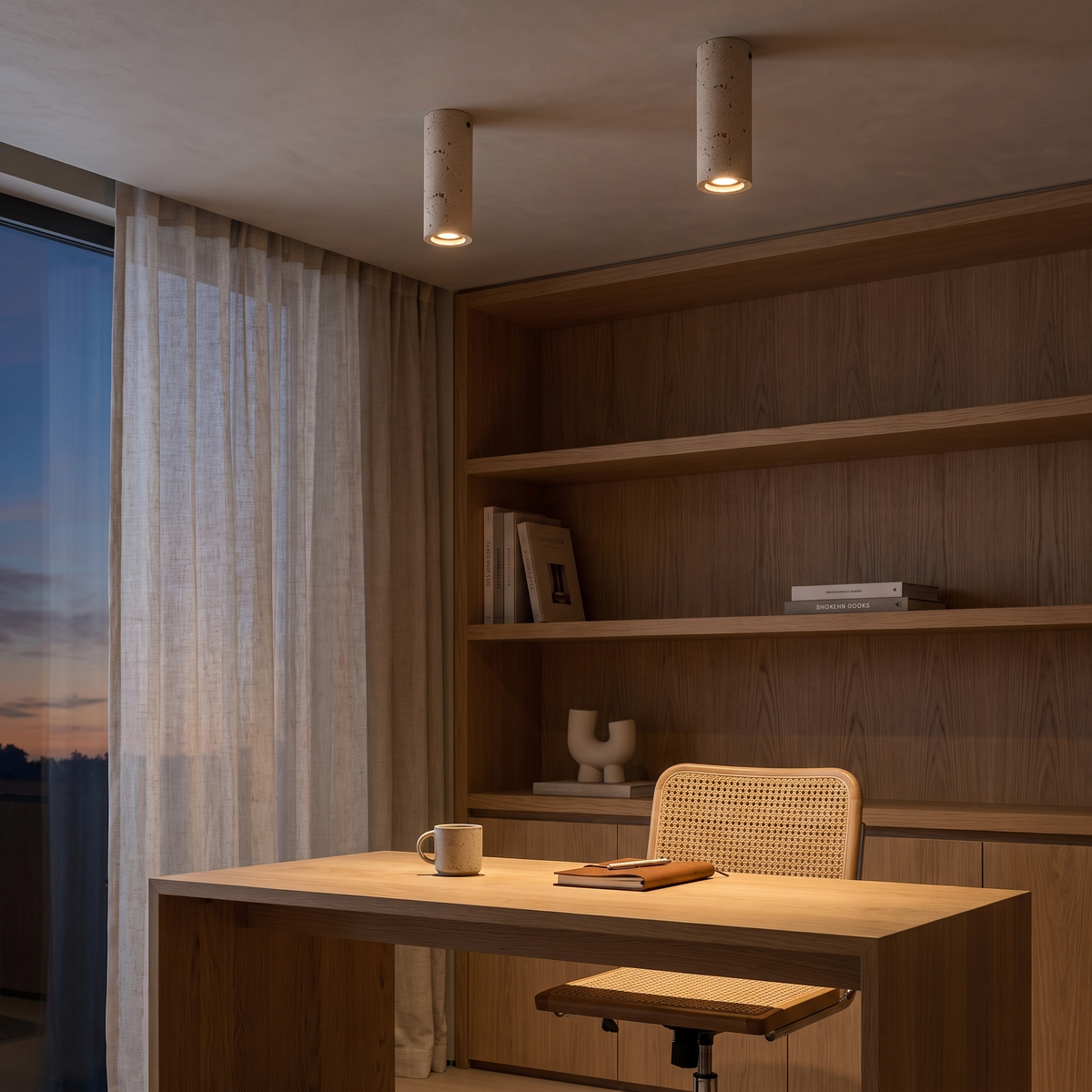 Amon travertine ceiling light in medium, a pair above an oak desk in a home office