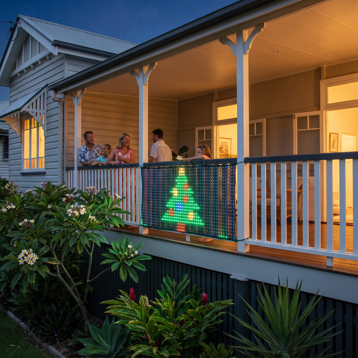 Antonia smart LED mesh curtain lights showing a pixel Christmas tree on a Queenslander verandah