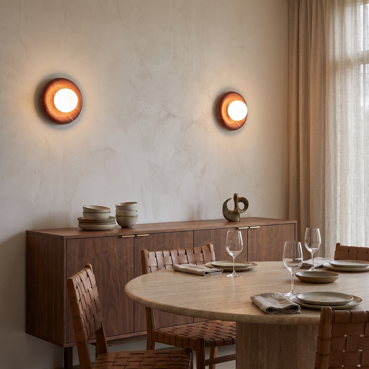 Aril marble wall sconce in a dining room