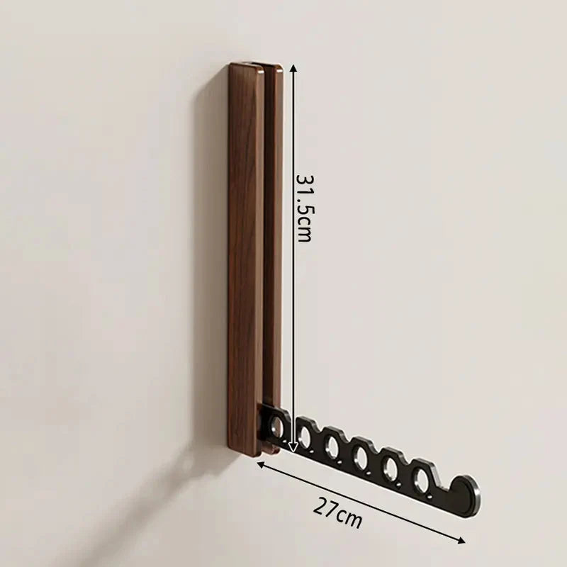 Arnie timber hanger rail in black walnut showing a 31.5cm timber batten and a 27cm fold-down arm