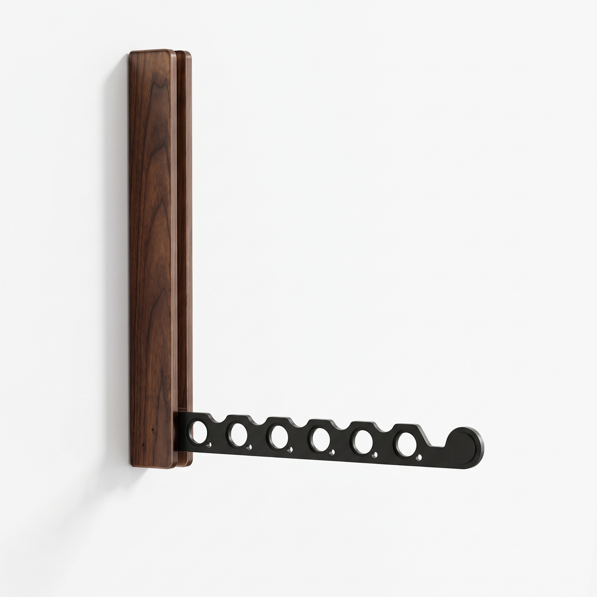 Arnie timber hanger rail in black walnut with the notched arm folded down, on a plain white background