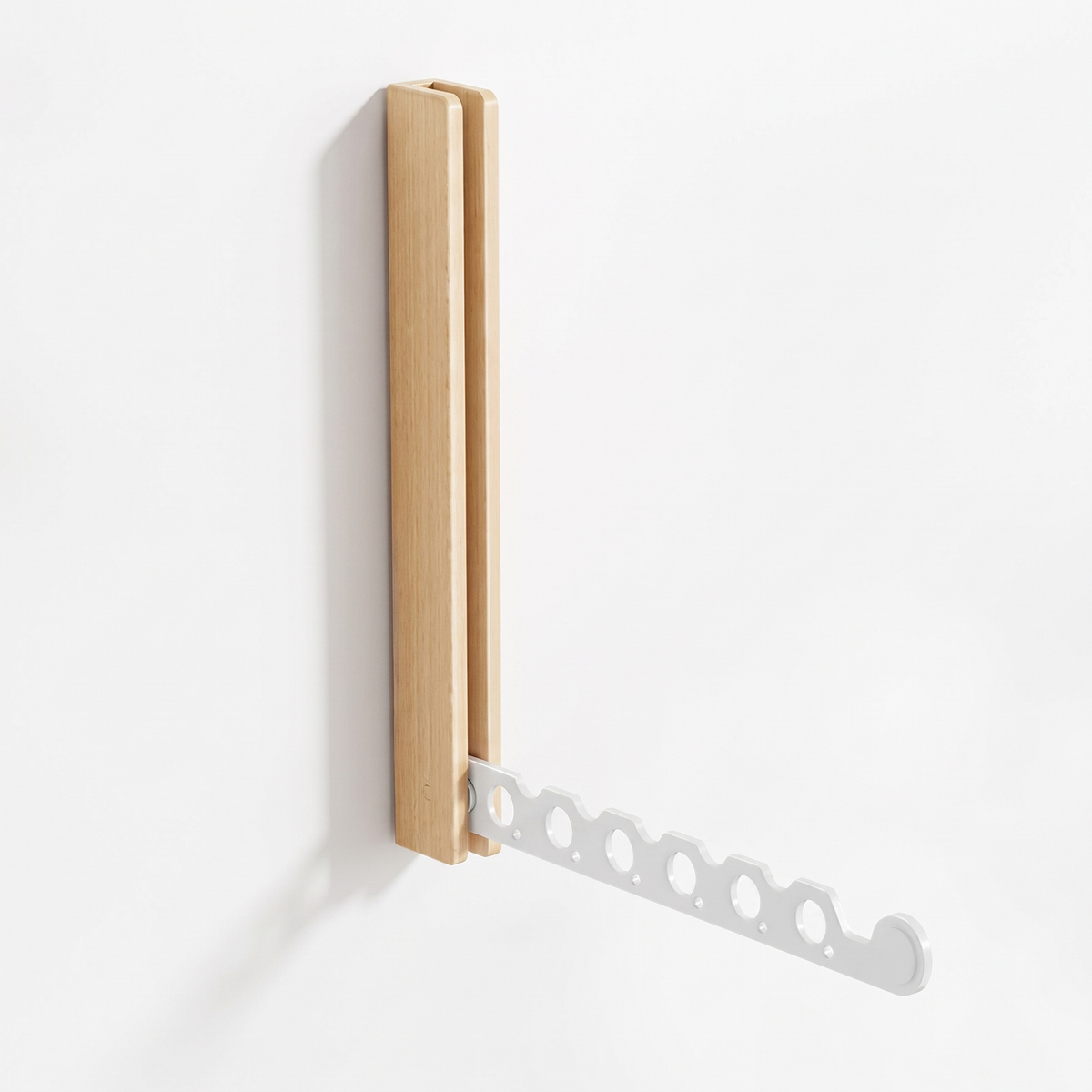 Arnie timber hanger rail in white with the notched arm folded down, on a plain white background