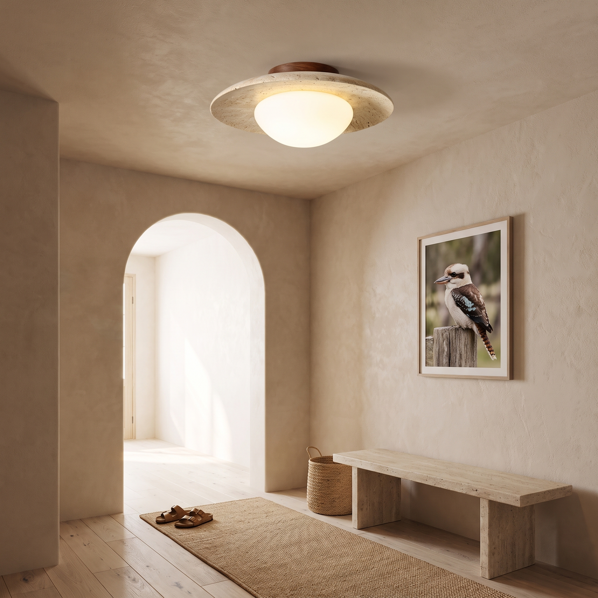 Bali travertine ceiling light in an arched entry hallway with a travertine bench seat and jute runner