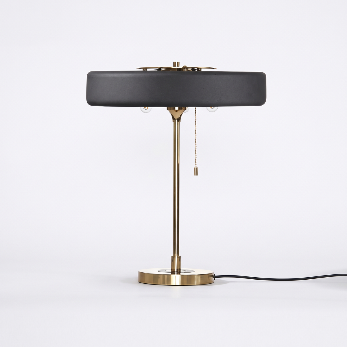 Baya minimalist table lamp in black on a white background