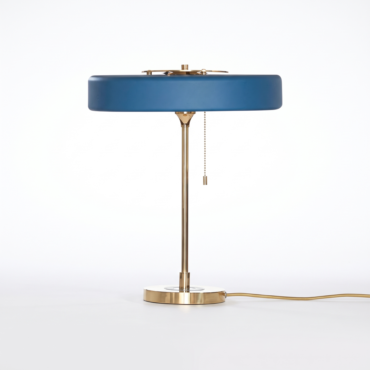 Baya minimalist table lamp in blue on a white background