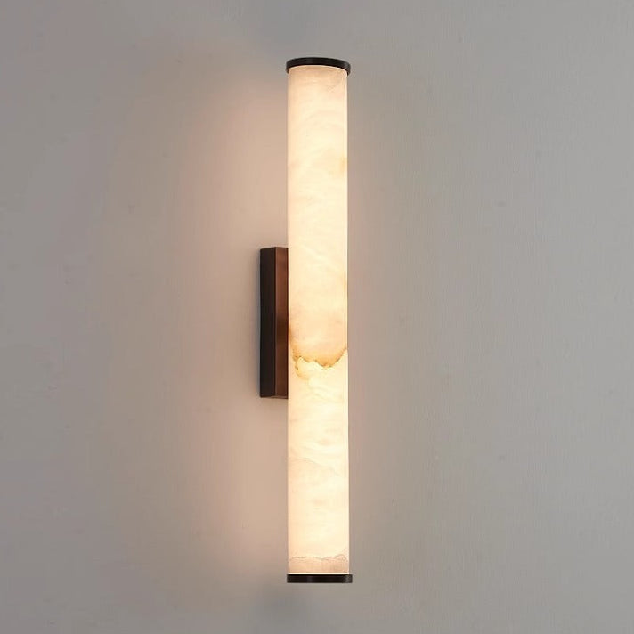 Bega marble wall light close-up of copper backplate