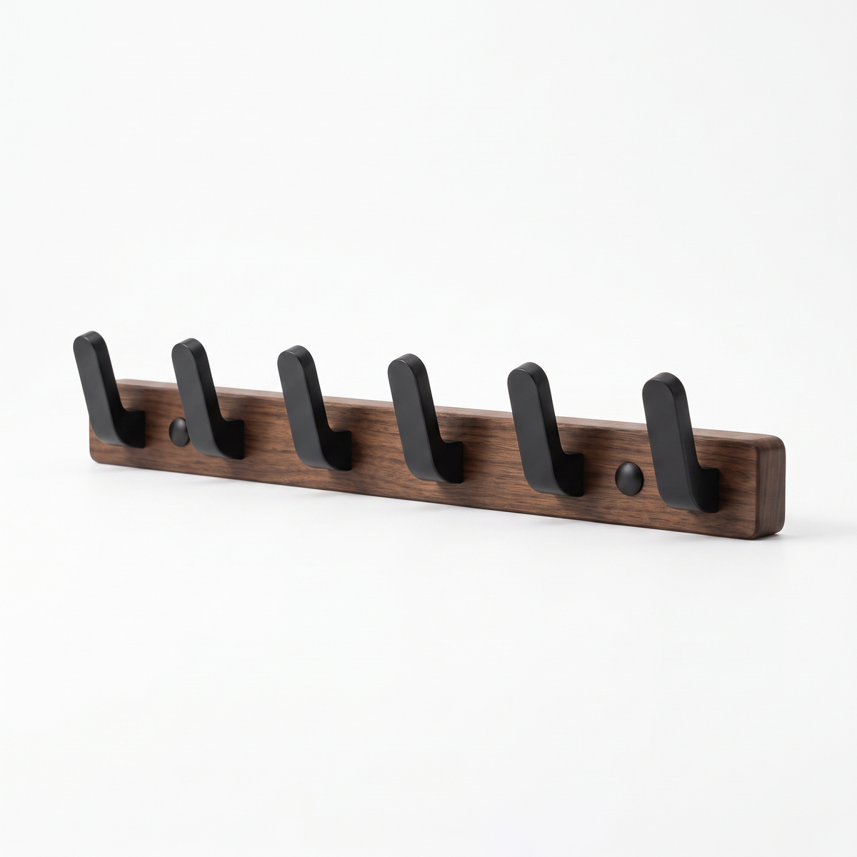Bodhi wooden wall hooks 6 hook walnut rail with black hooks on a white background