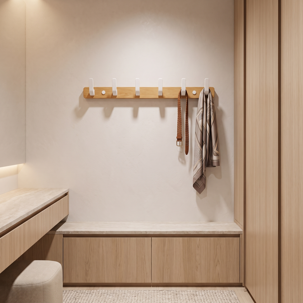 Bodhi wooden wall hooks with 6 white hooks on a timber rail in a walk-in robe dressing area