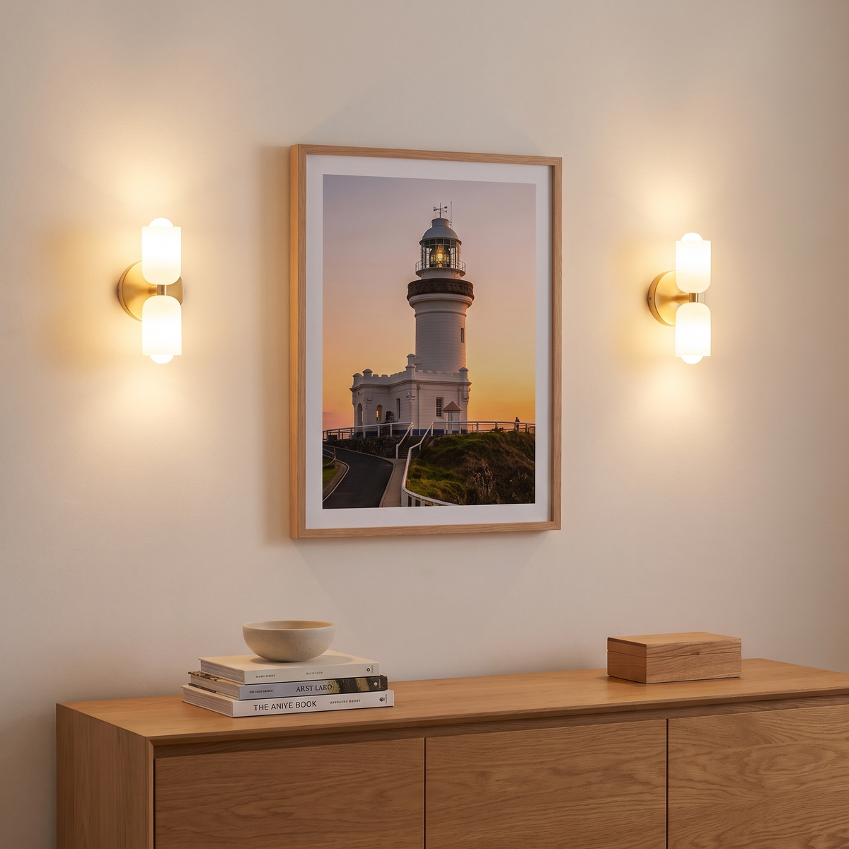 Boni up and down wall light in gold in a living room