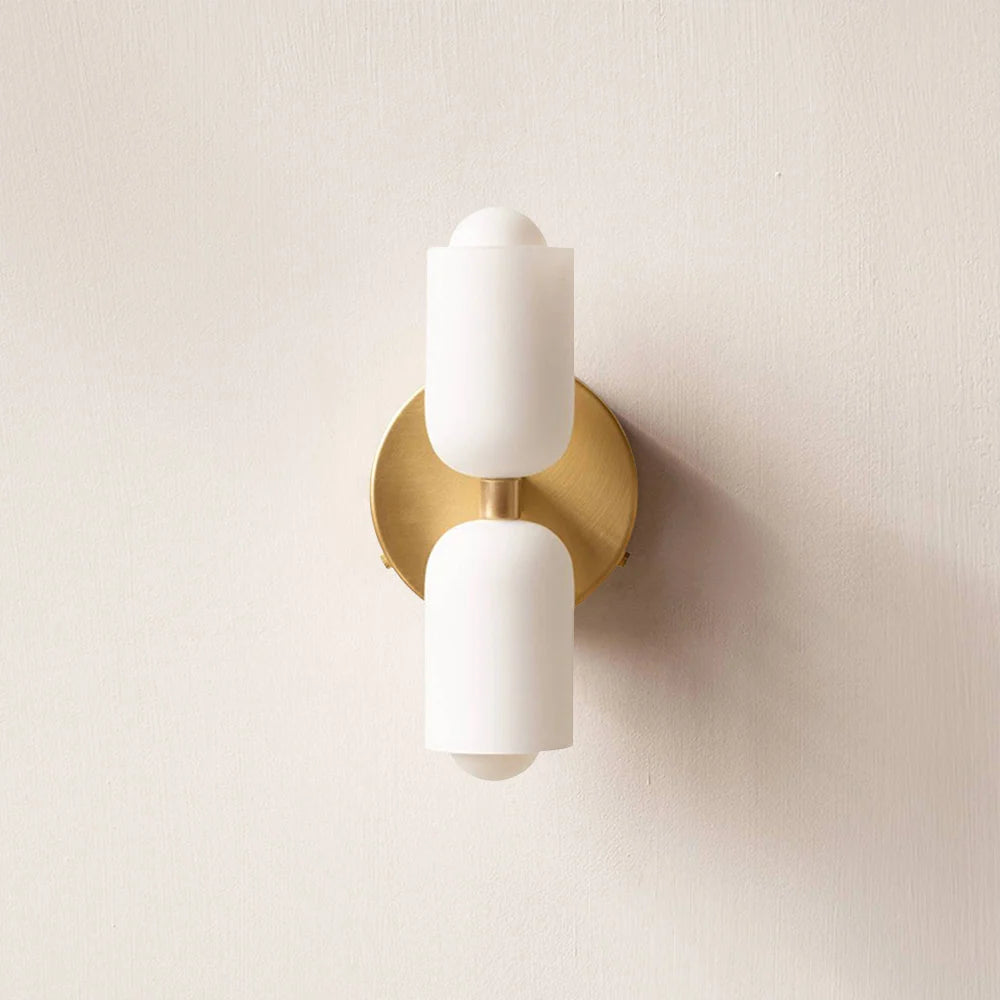 Boni up and down wall light with a gold wall plate and two white scalloped opal shades