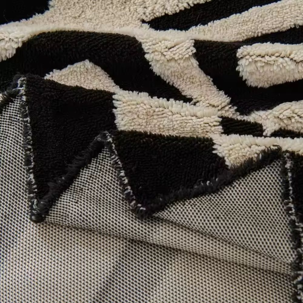 Breck jacquard maze sofa cover fitted on a sofa in a living room