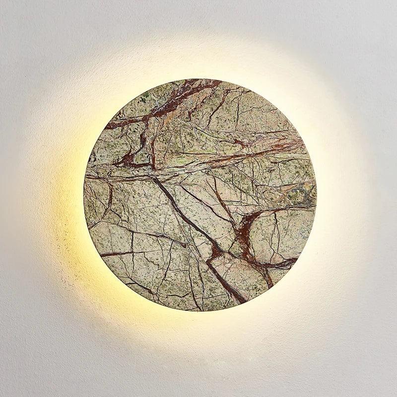 Bronte marble wall sconce close-up of circular stone texture