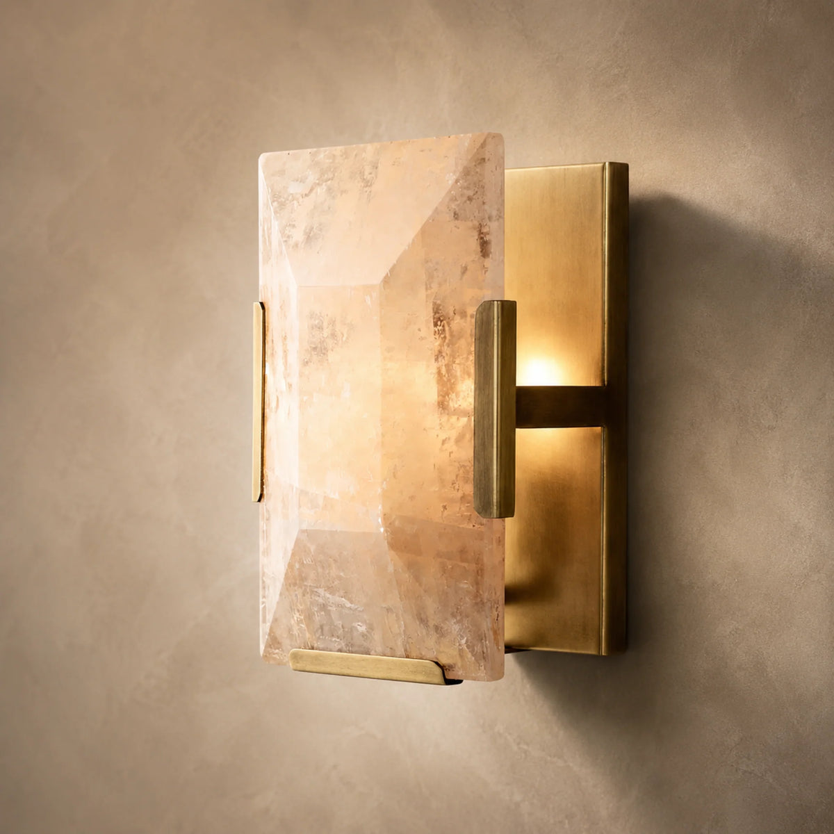 Bunga alabaster wall light in gold with the natural stone slab glowing warm