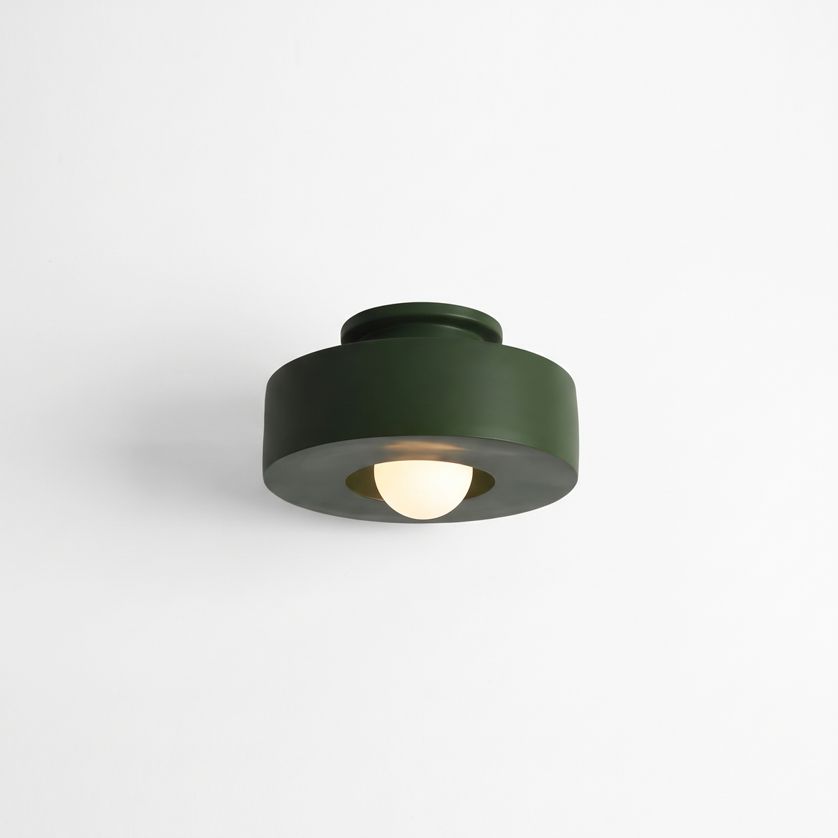 Cami LED ceiling light in forest green on a plain white background