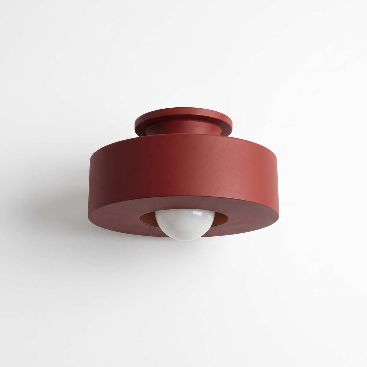 Cami LED ceiling light in burgundy red on a plain white background