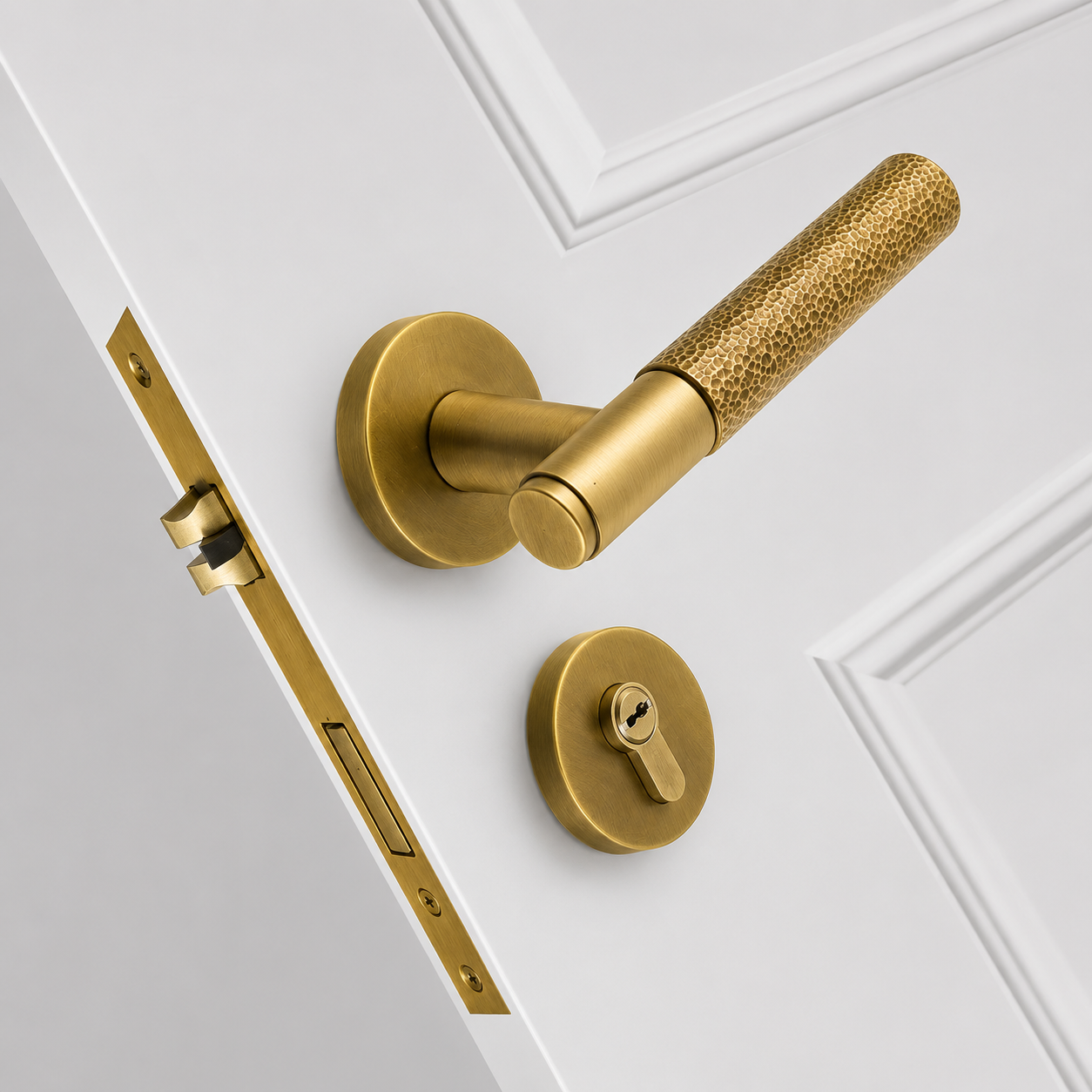 Close-up of the hammered brass finish on the Cammeray Brass Door Lock Set