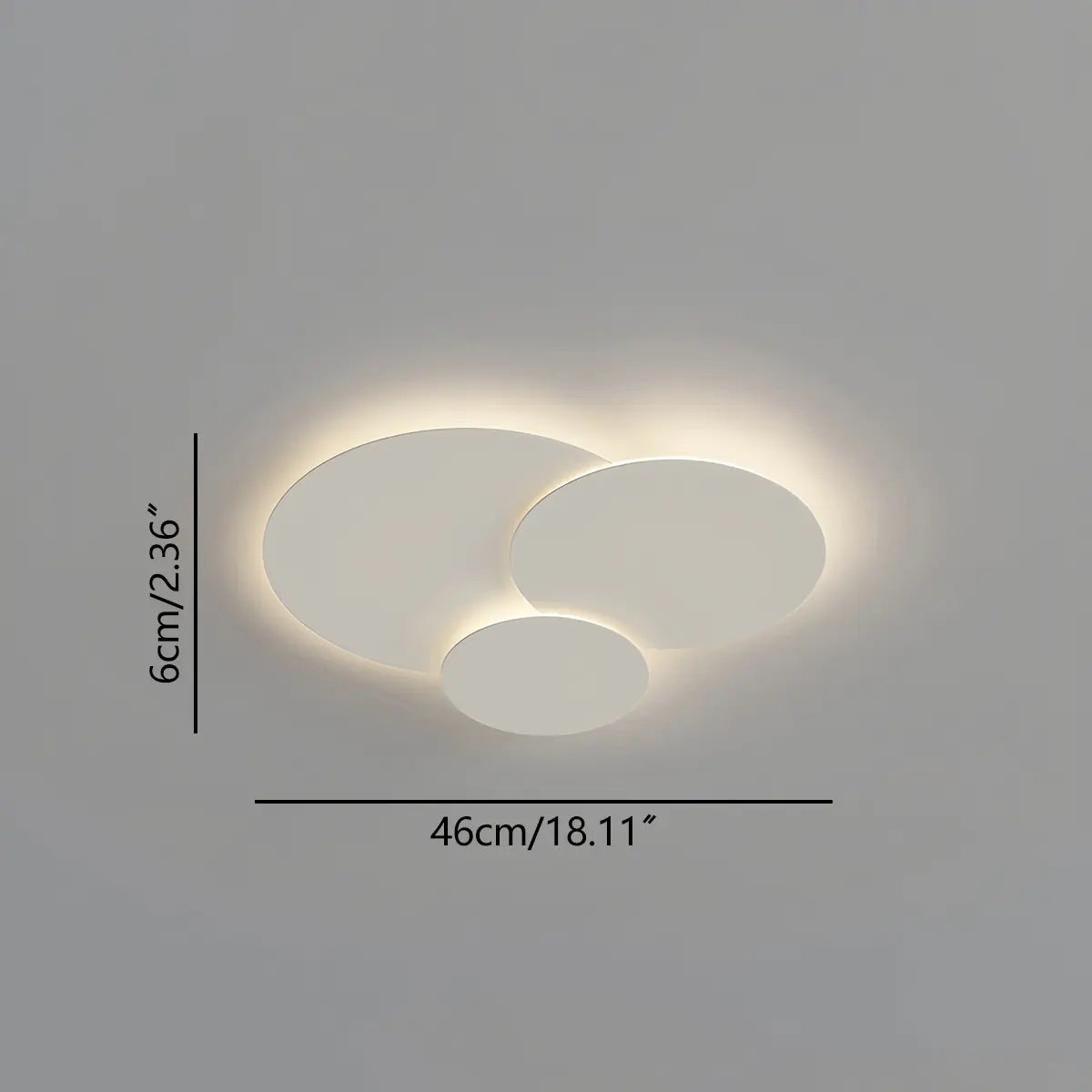 Cloey LED ceiling light, an overlapping matte white disc cluster, shown installed flush to a ceiling