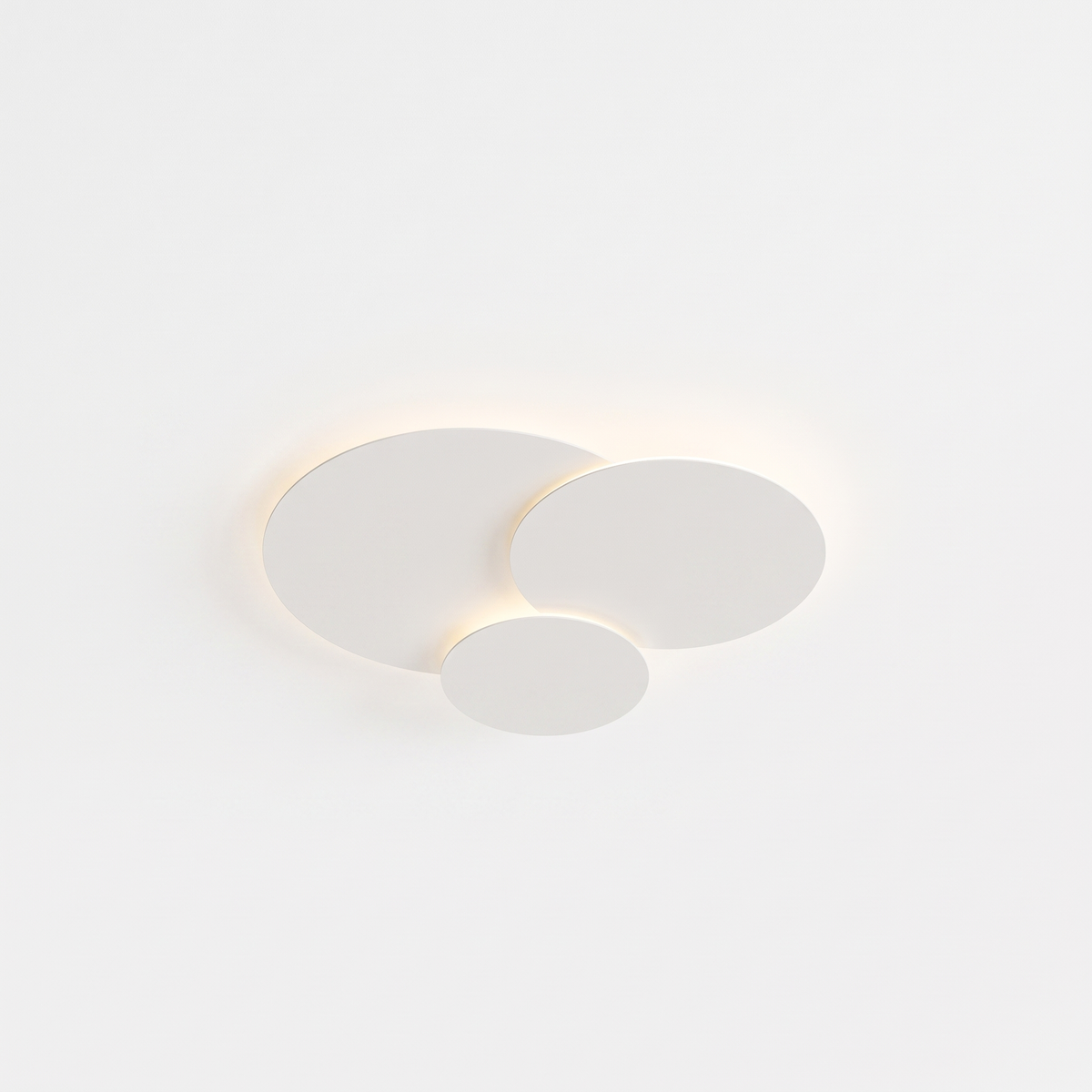 Cloey cloud disc LED flush mount ceiling light on a plain white background