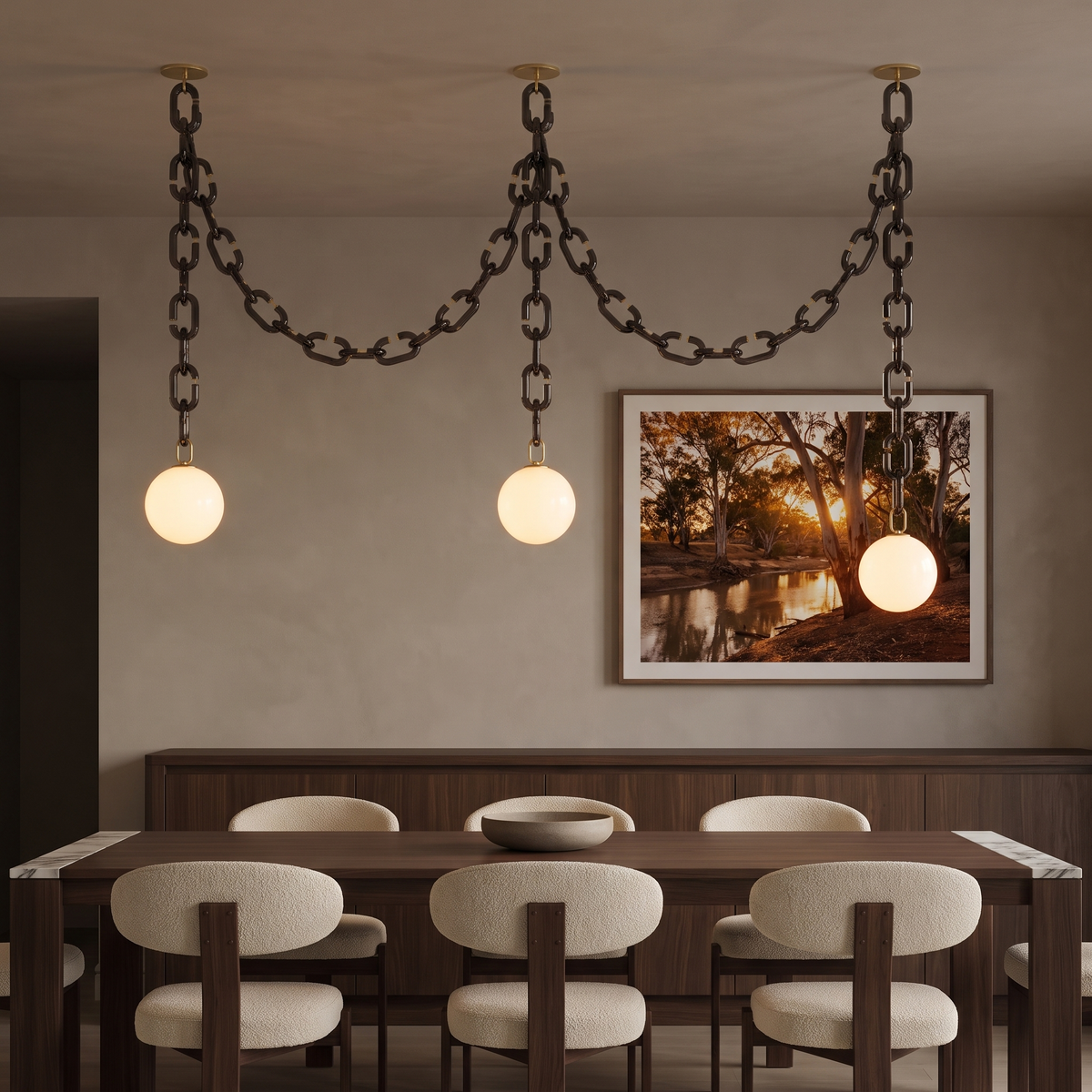 Clove 3-head glass chain pendant light in smoky glass with white globes over a walnut dining table