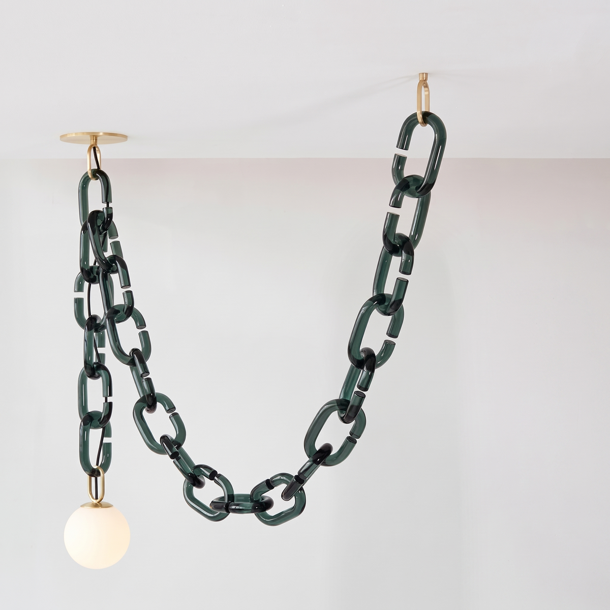 Clove dark green glass chain pendant light, 1 head with 22 links and brass canopies, on white background