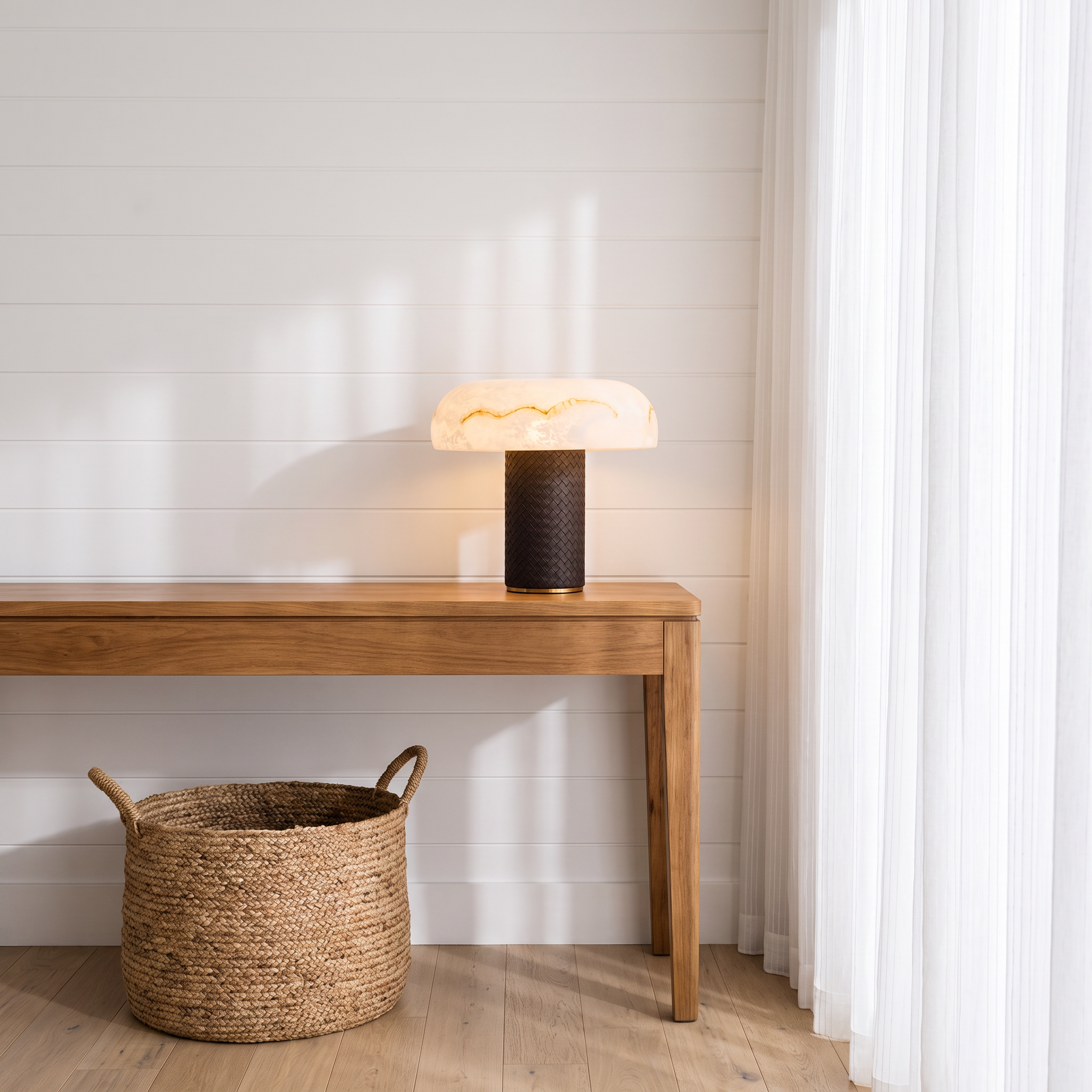 Cronulla Mediterranean glass-dome table lamp on a console in a beach house living room