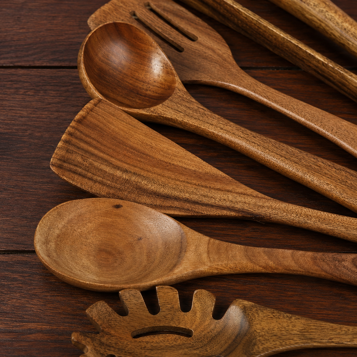 Close-up of the Culi Wooden Utensils Set showing the natural wood grain