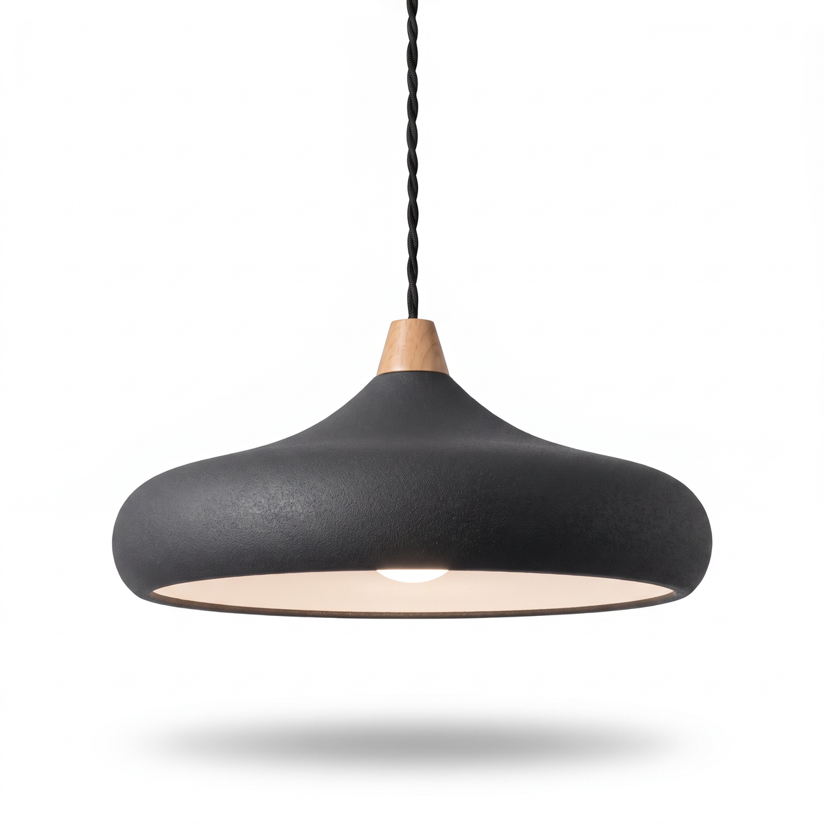Dakota black disc pendant light on a white background
