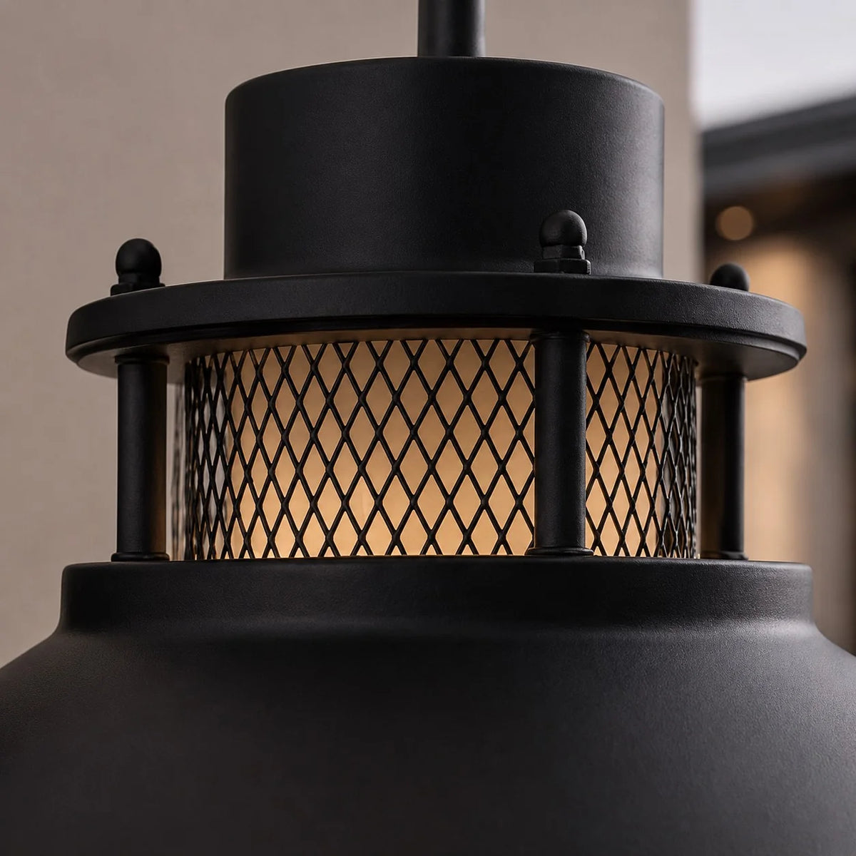 Docking vintage outdoor wall light close up of the black mesh gallery beneath the top cap