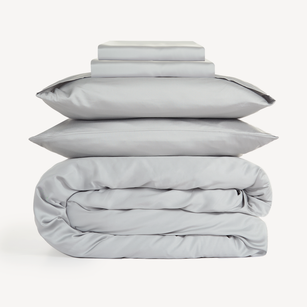 Eco Haven bamboo sheet set and duvet cover in grey folded on a white background