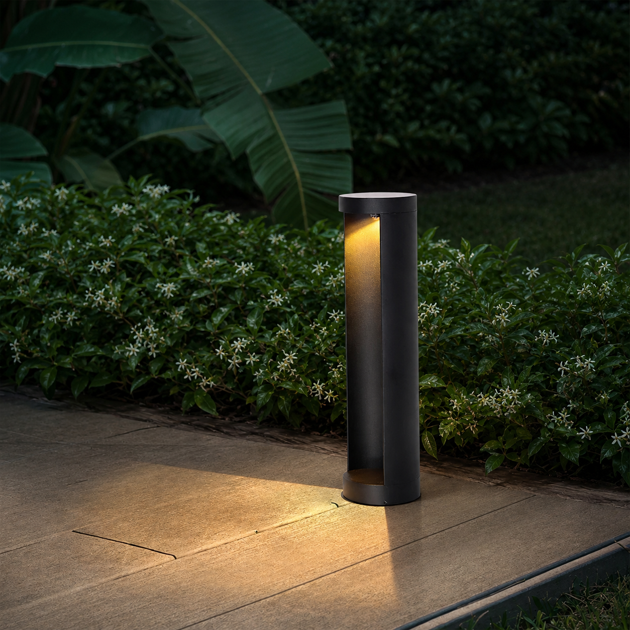 Elow Aluminium LED Garden Bollard Light displayed along a garden path