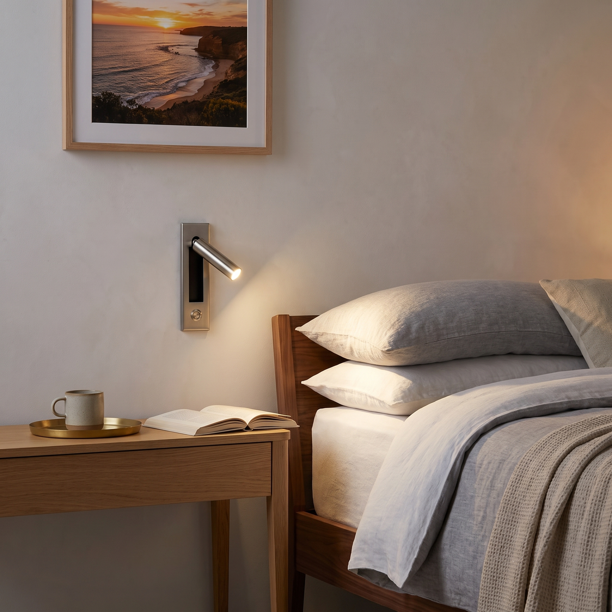 Espy LED reading wall light in cylinder nickel beside the bed in a modern bedroom