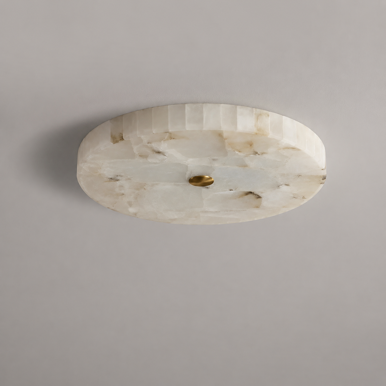 Close-up of the Flo Marble Ceiling Light's copper detailing
