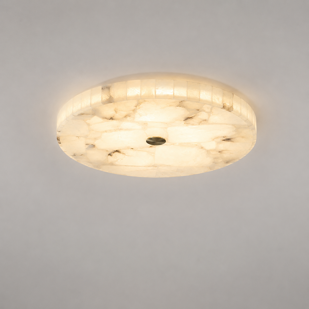 Flo Marble LED Ceiling Light glowing with warm light