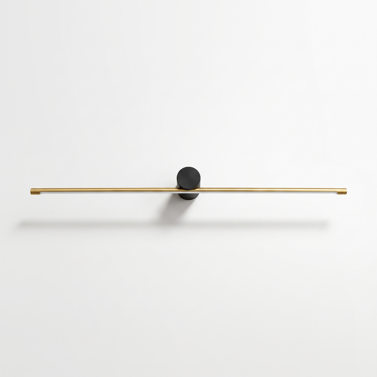 Hartog linear vanity light bar with gold bar and black cylinder mount on a white background