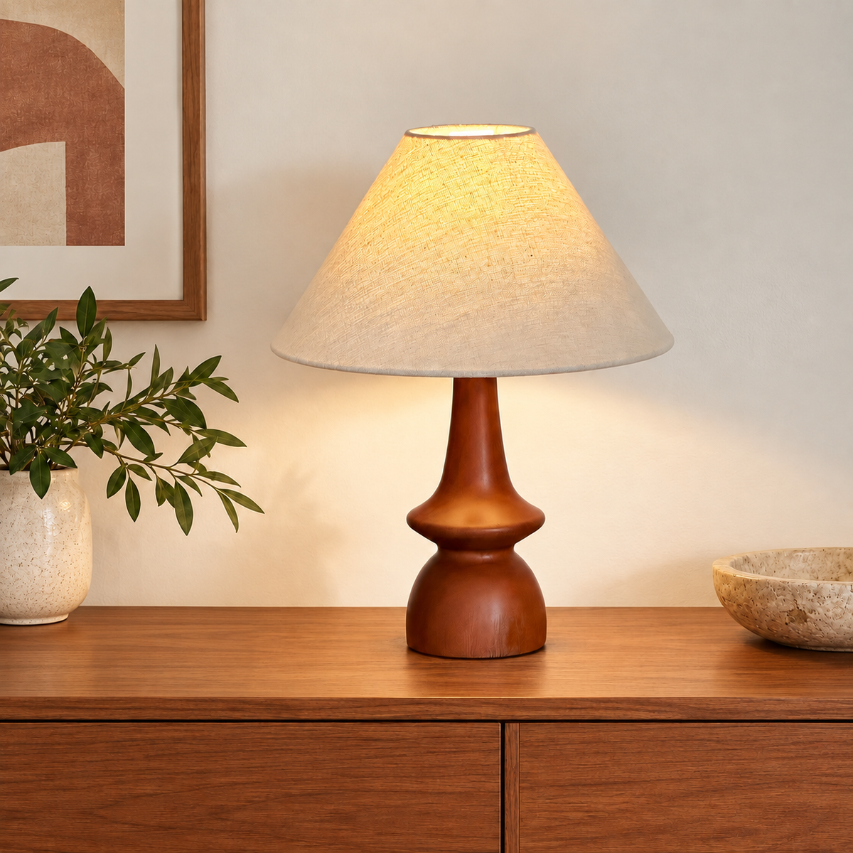 Hawk solid wood table lamp with linen shade in a warm bedroom