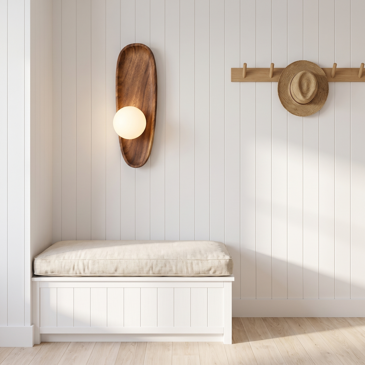 Slim Henny Model B walnut wall lamp above a bench in a coastal entry nook