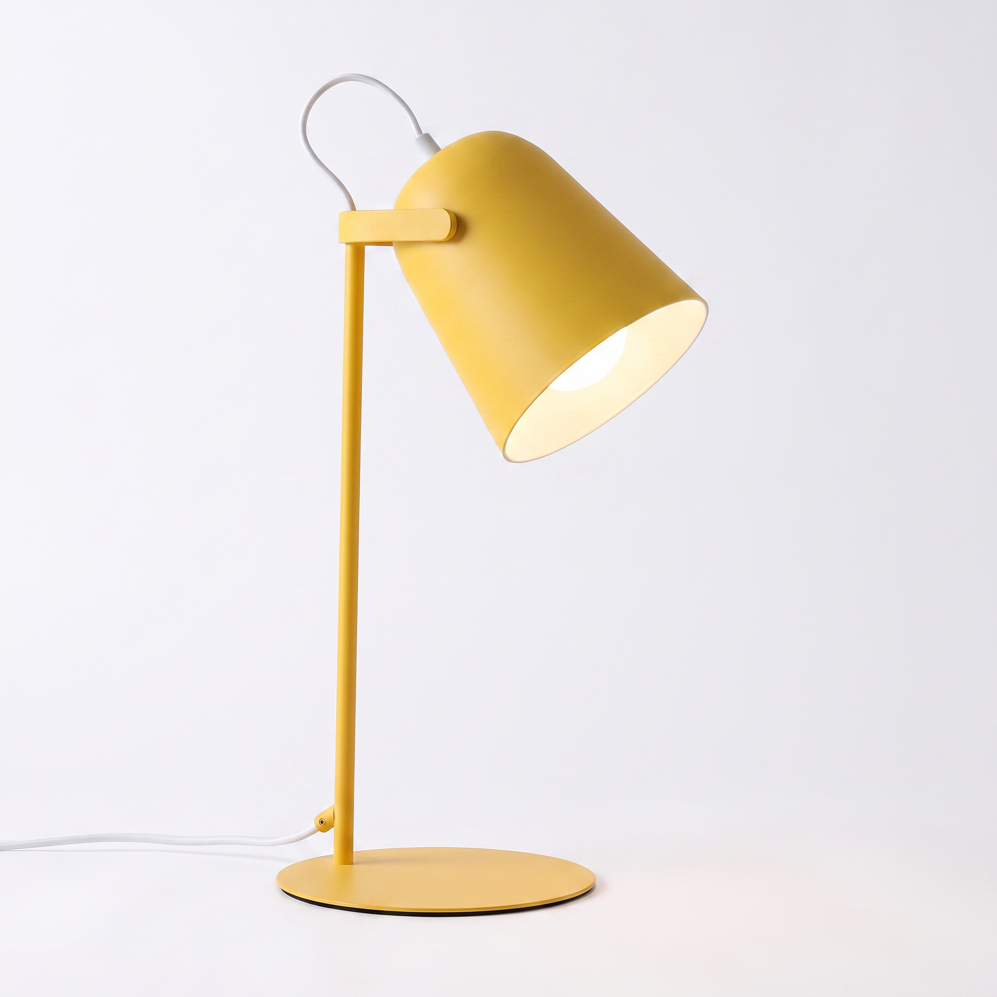 Hossegor matte macaron adjustable table lamp in yellow on a white background