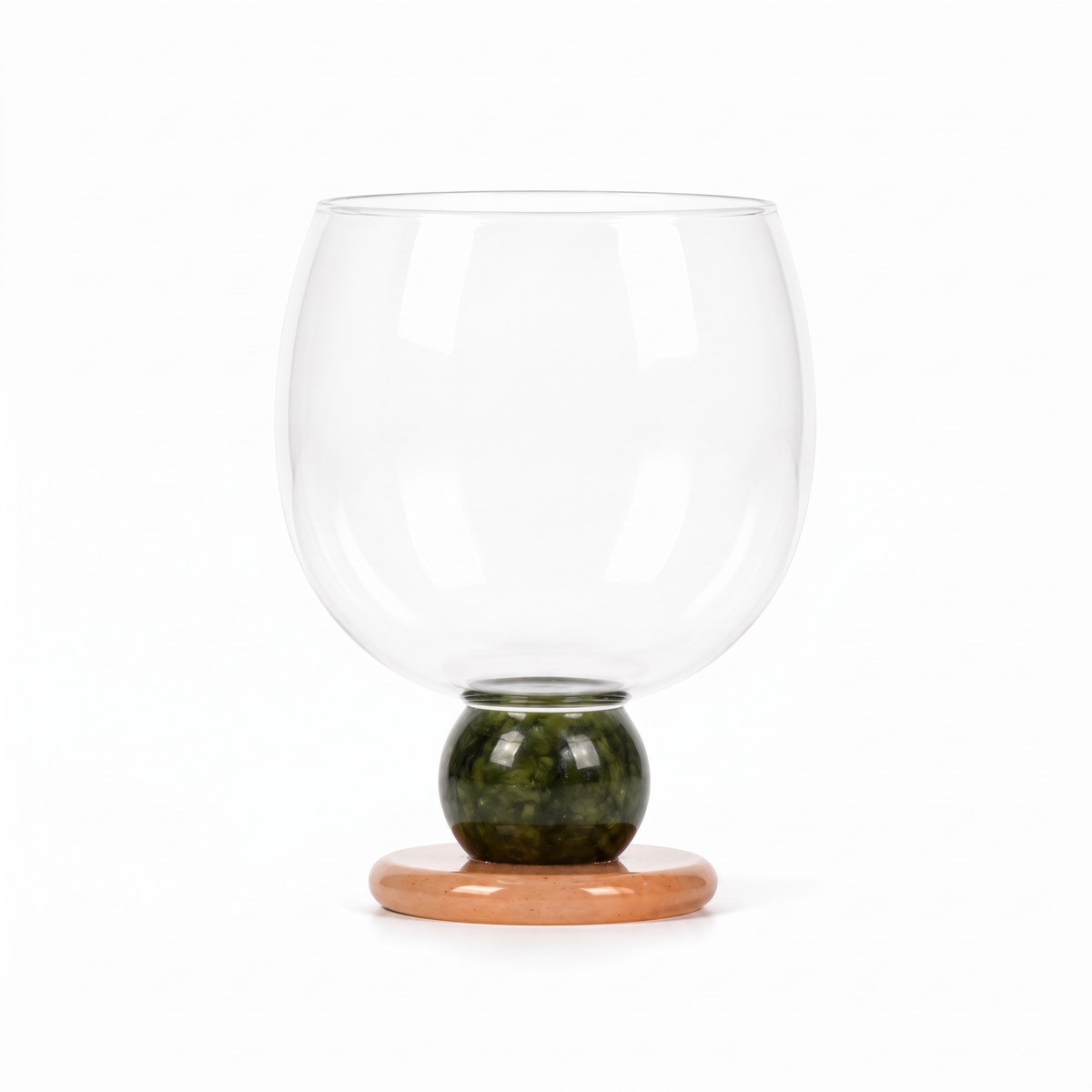 Ivy Sculptural Borosilicate Drinking Glass in Green on a plain white background
