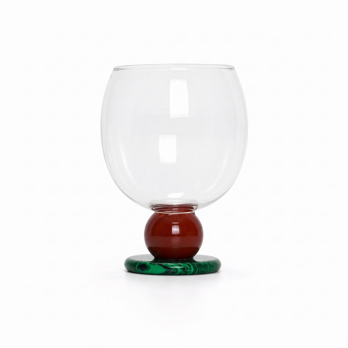 Ivy Sculptural Borosilicate Drinking Glass in Red on a plain white background