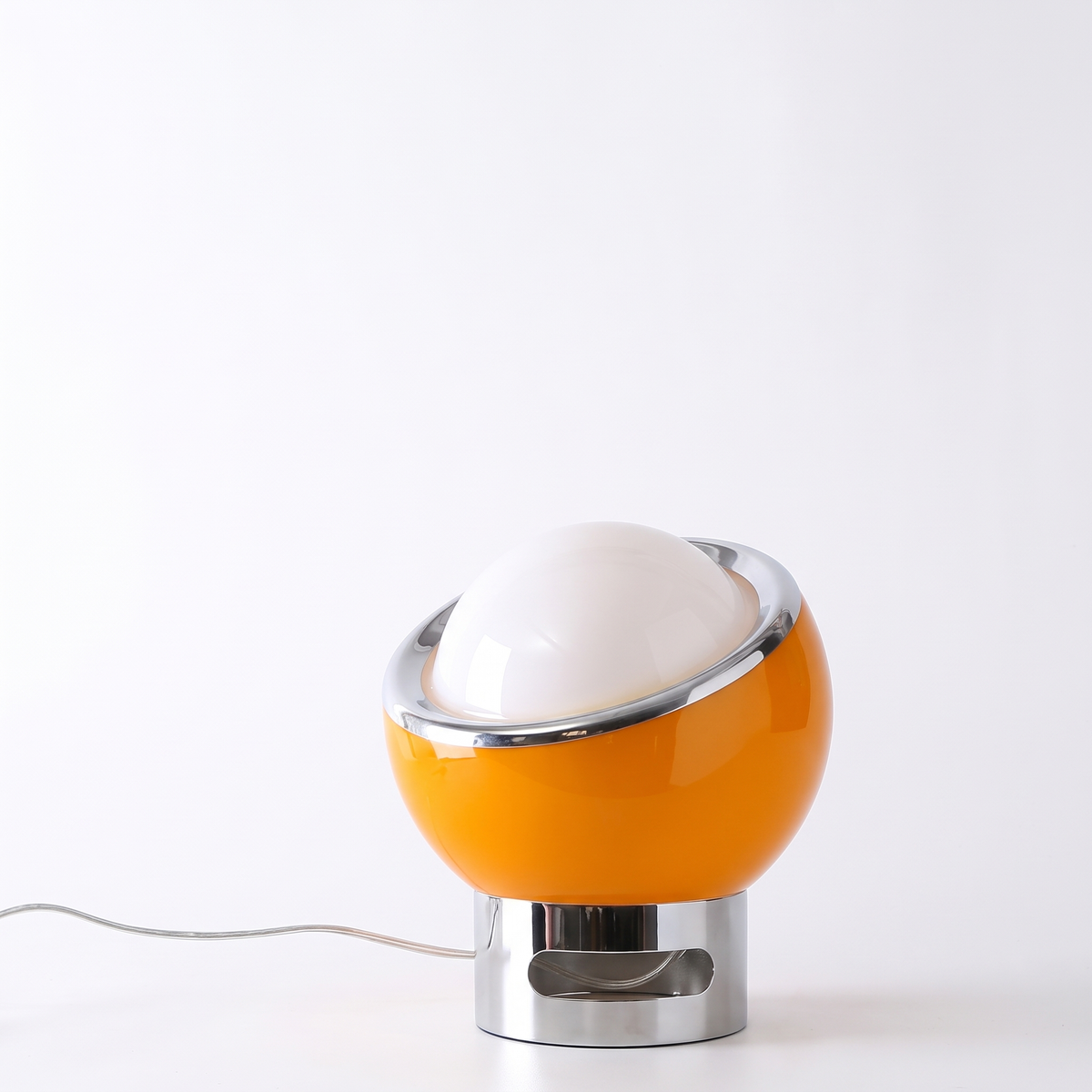 Jayla Bauhaus table lamp in orange with opal glass shade on a white background