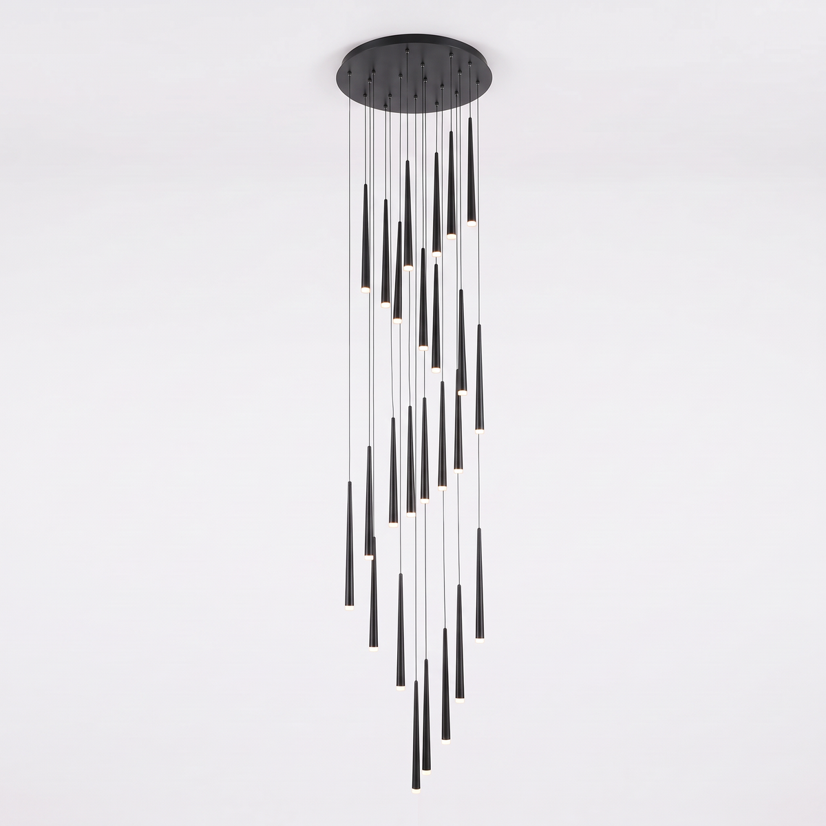 Jundaru pendant light in black with slim tapered LED heads on a white background
