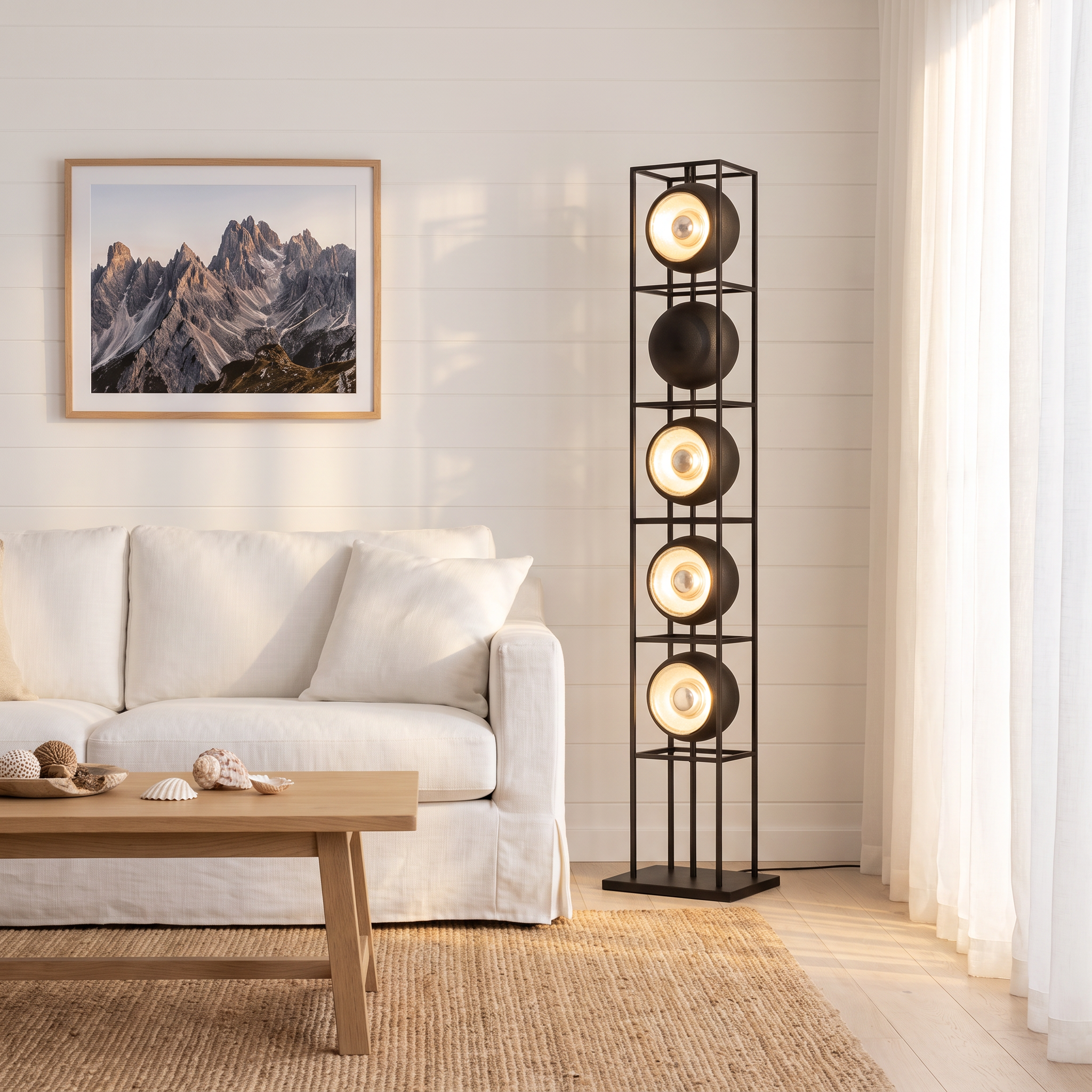 Kioloa black LED floor lamp in a bright coastal beach house living room