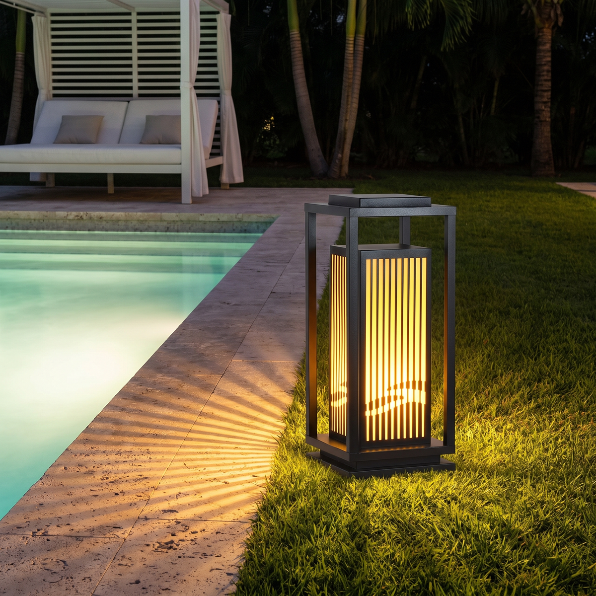 Large Ballina slatted garden lantern on a lawn beside a swimming pool