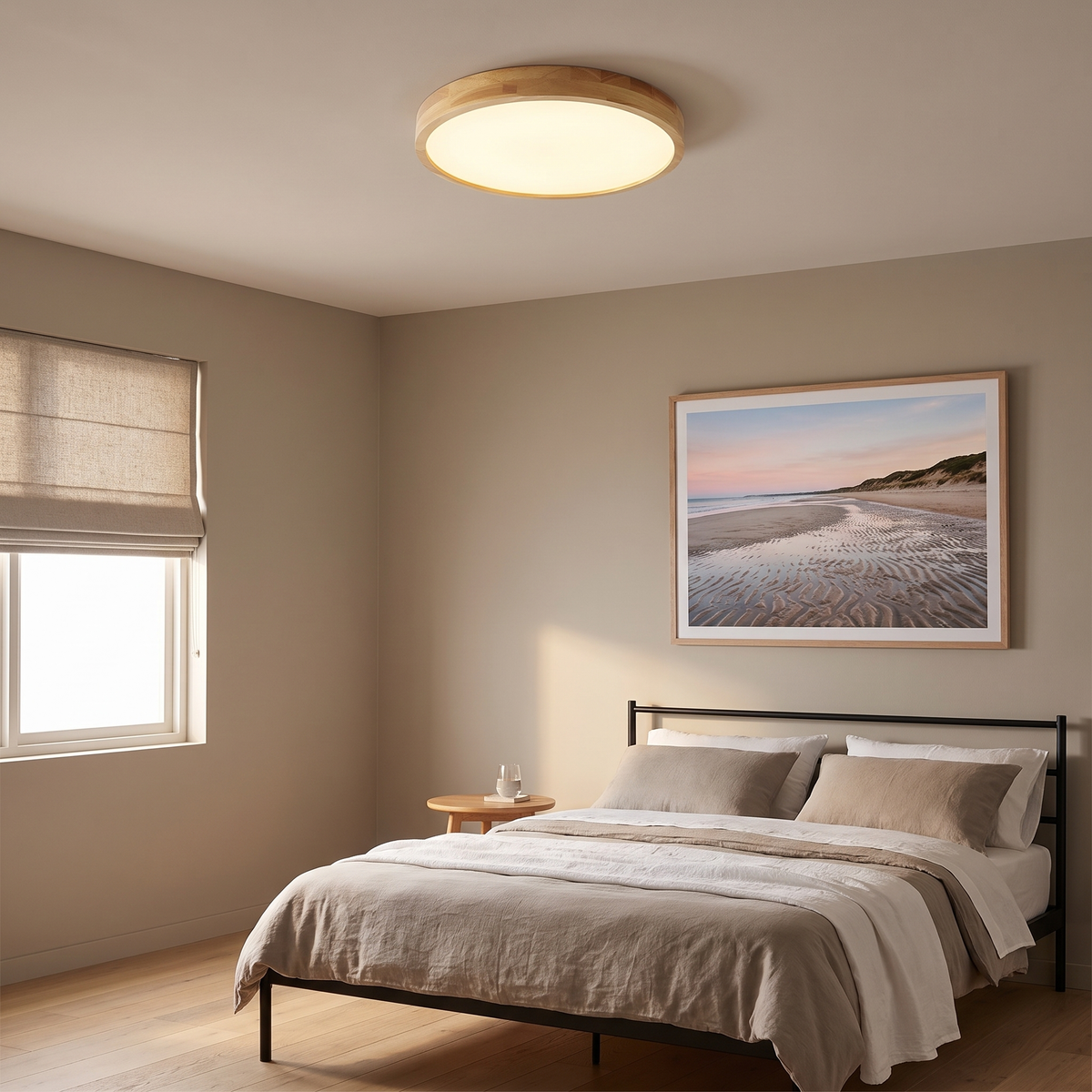 Lerie round timber LED ceiling light in a calm bedroom with a slim black metal bed frame