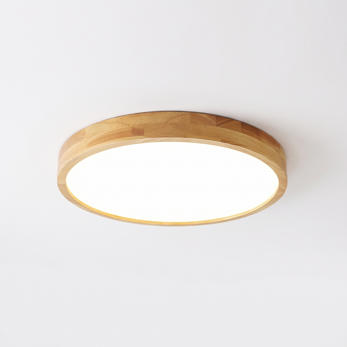 Lerie round timber LED flush mount ceiling light on a plain white background