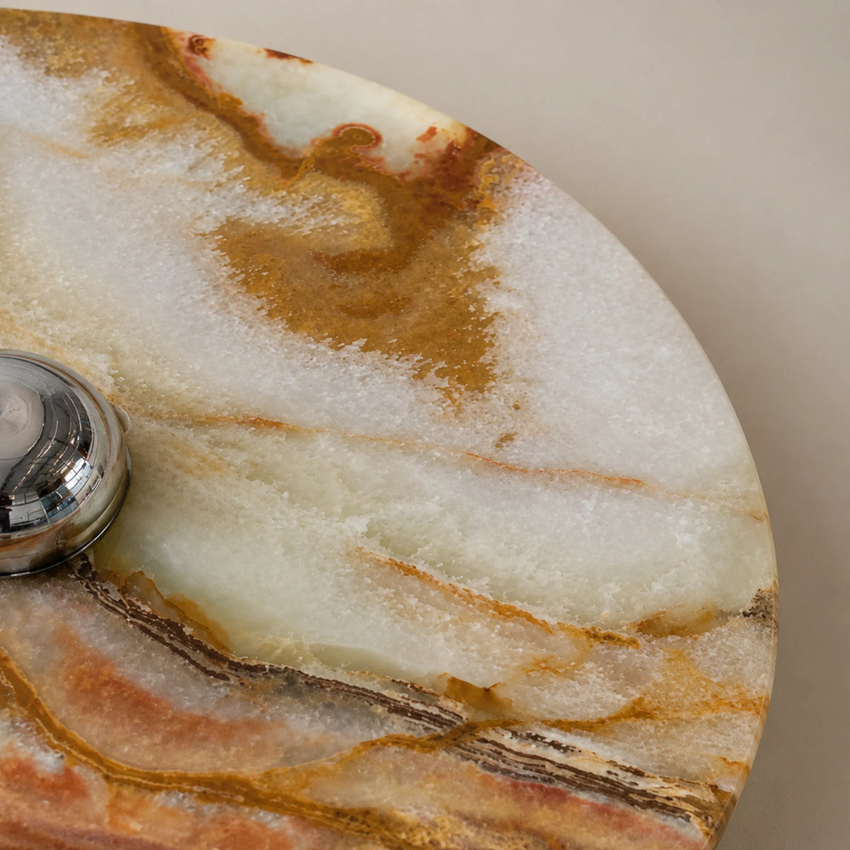 Lias jade onyx wall sconce close-up of the translucent natural onyx stone and chrome cap