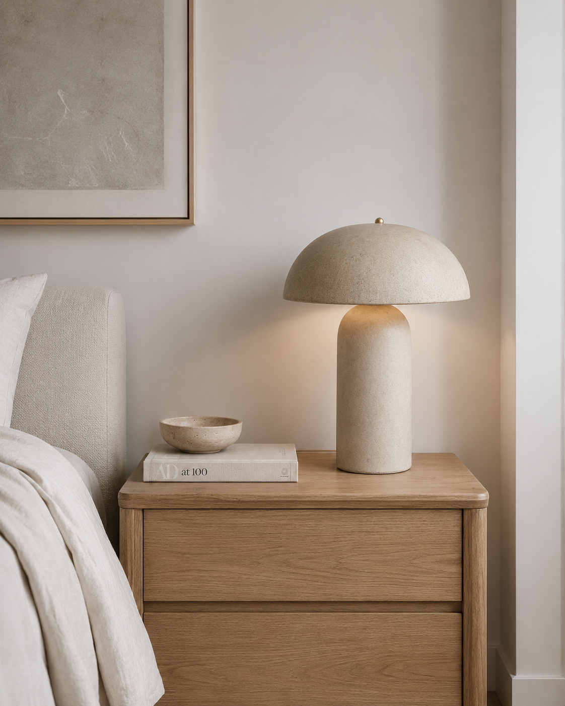 Luvira Ceramic Desk Lamp illuminated in a living room